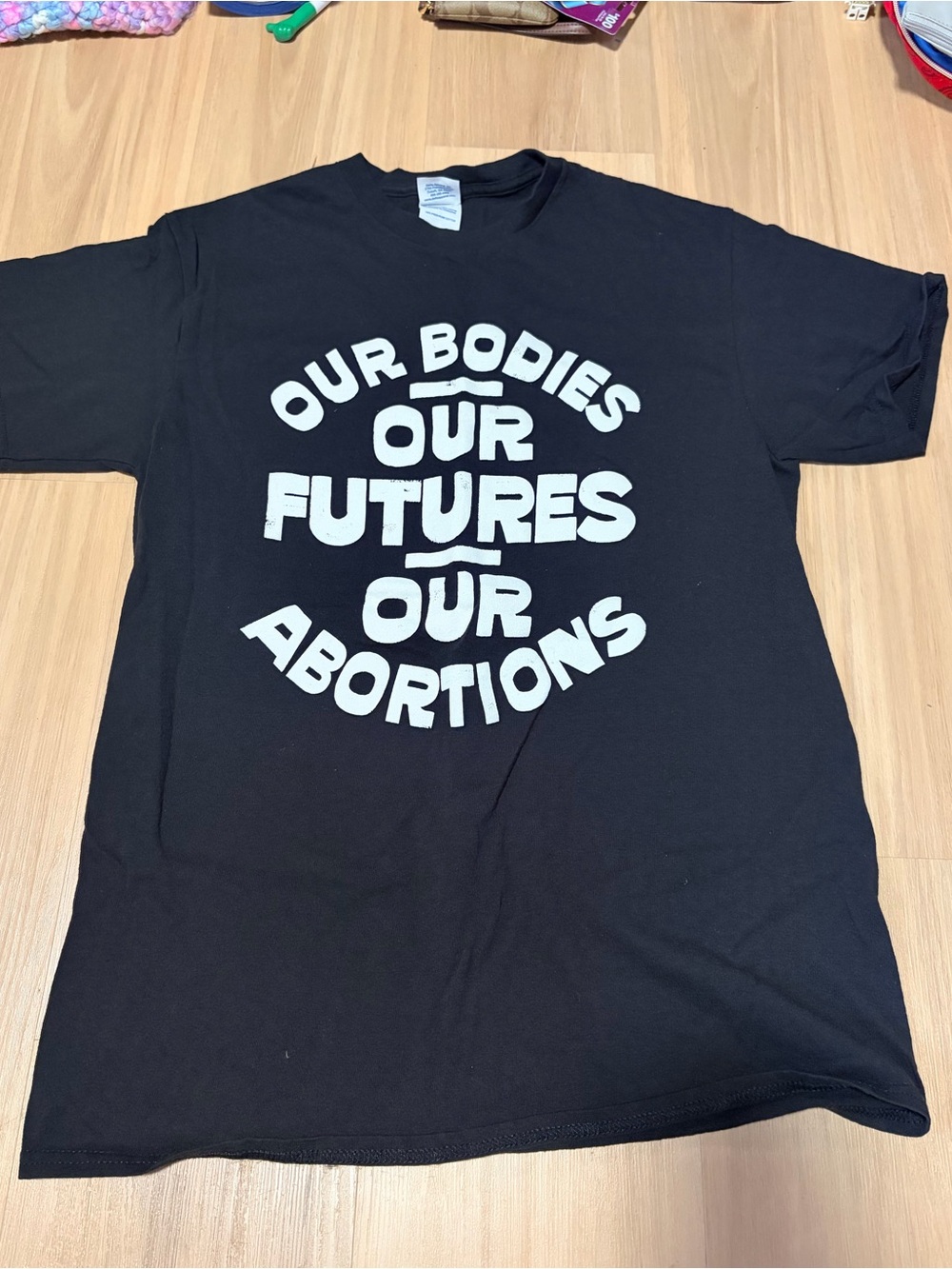 Delta Black Short-Sleeve Tee with White Graphic Text